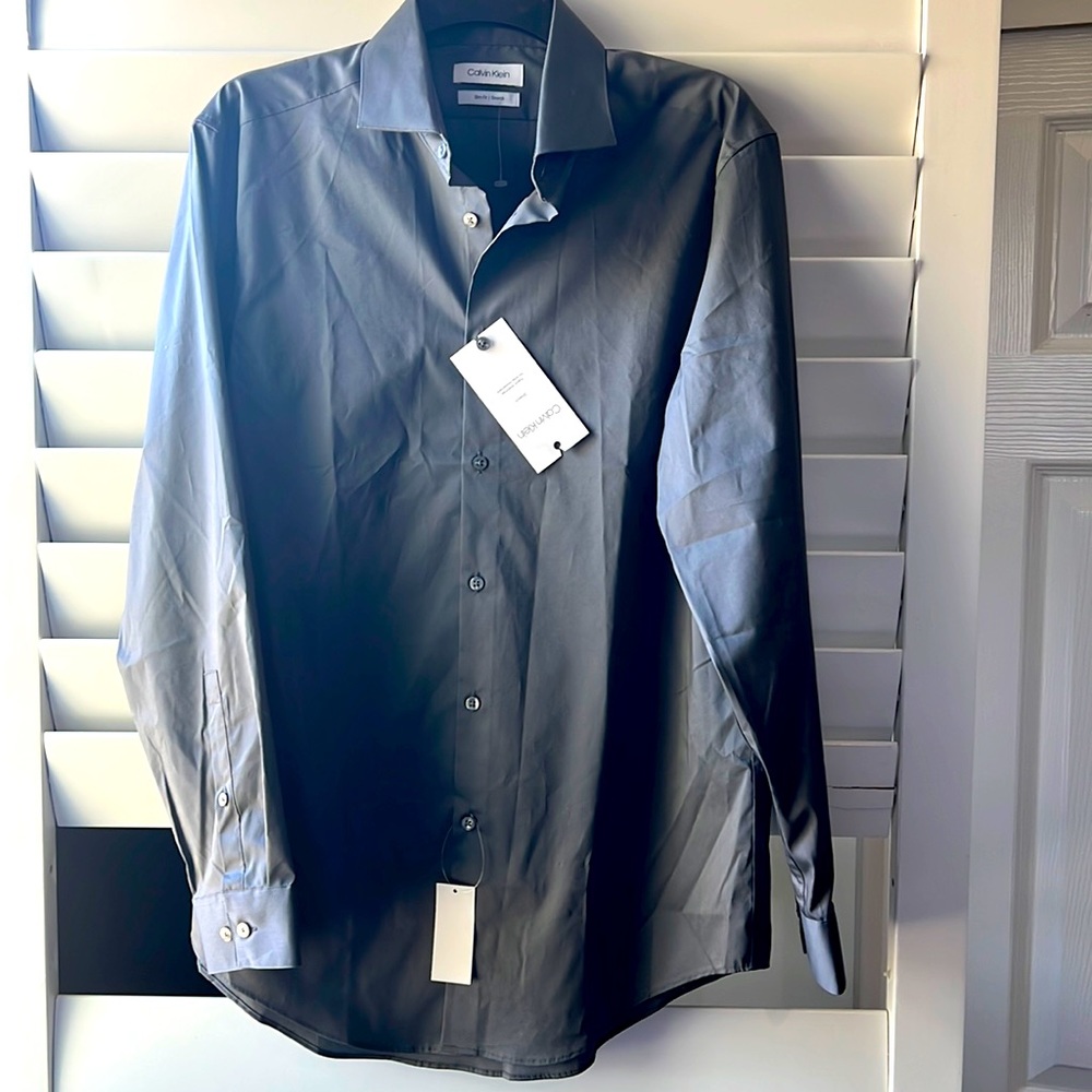 Brand new Calvin Klein medium size slim fit stretch dress shirt